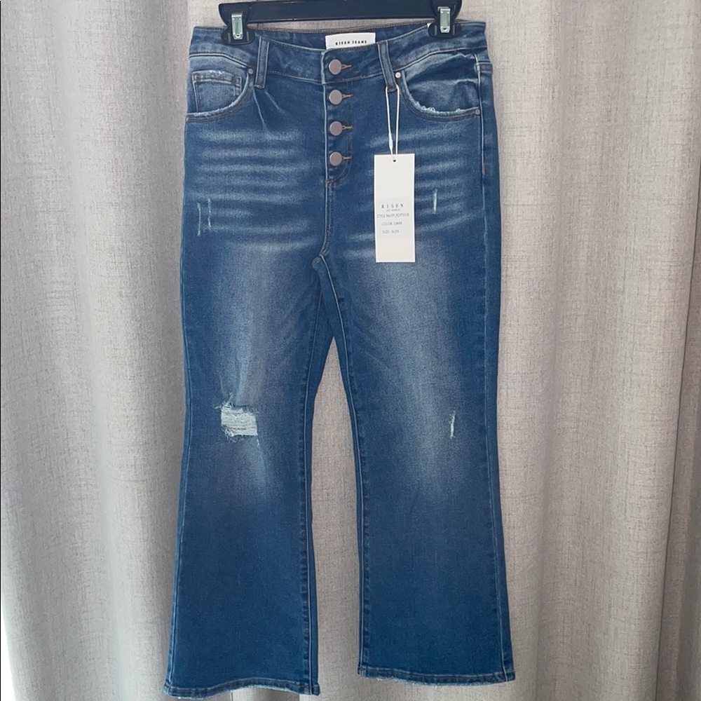 Risen Blue Flare Leg Jeans with Button Closure. Size 9/29 NWT